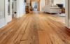 Luxury Vinyl Plank Flooring vs Hardwood Flooring for Modern Living - Post Thumbnail